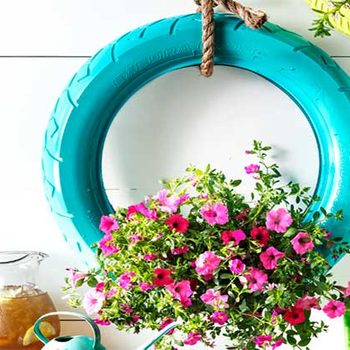 diy hanging tire planter with flowers